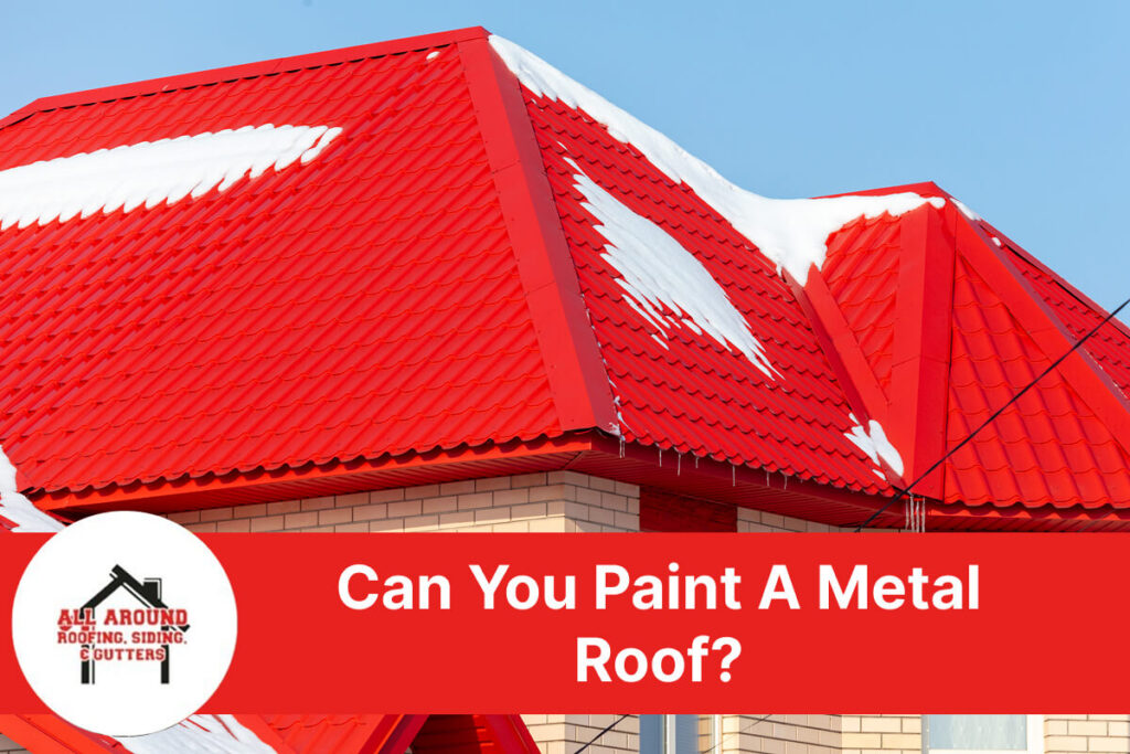 Red metal roof with snow, highlighting roof painting topic